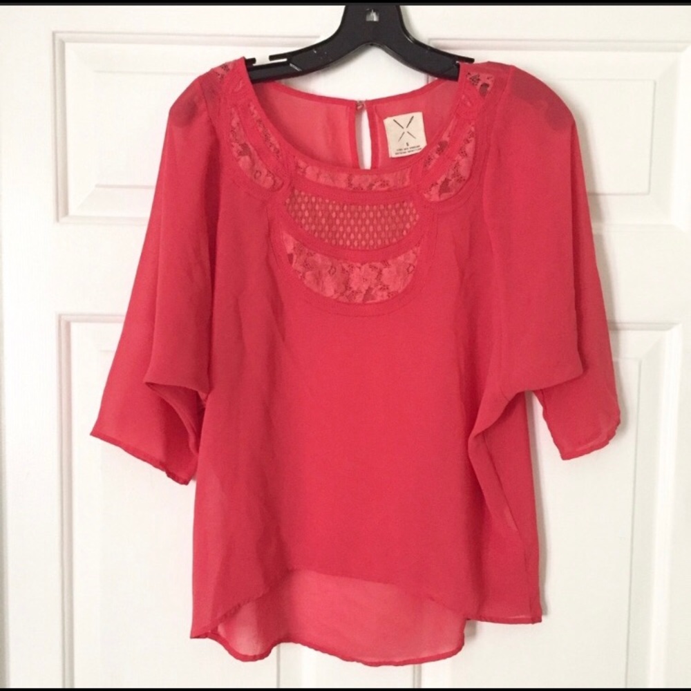 Urban Outfitters pinkish/reddish flowy blouse.